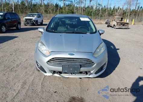 2015 Ford Fiesta Titanium z USA, uszkodzony, nr VIN 3FADP4FJ7FM140837